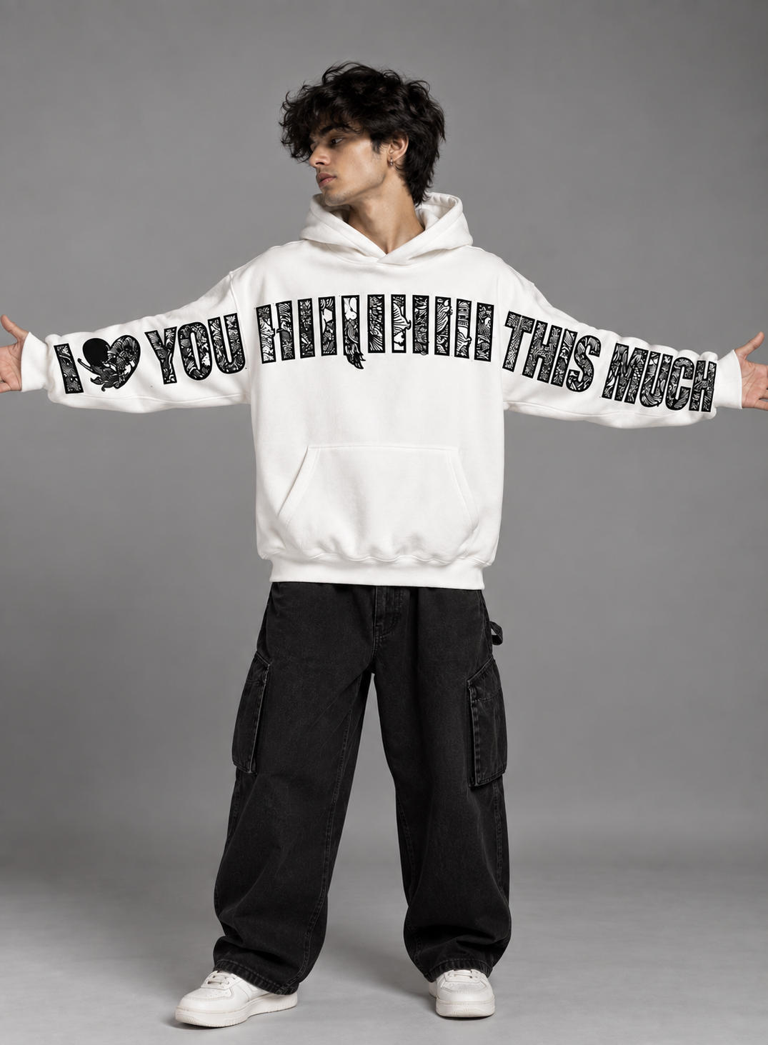 Section Zero I Love You This Much white oversized hoodie with black graphic print on chest and sleeves worn by male model